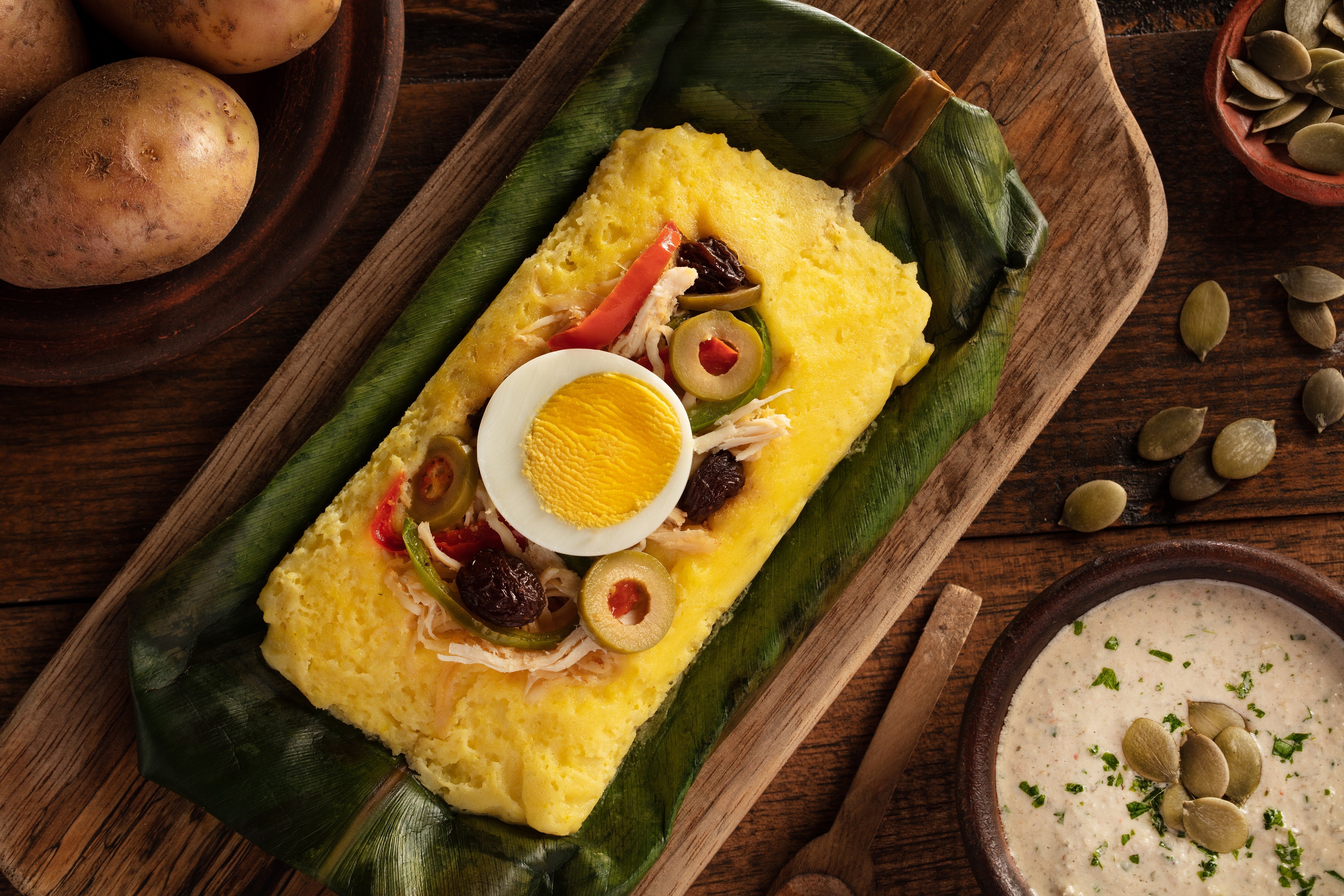 Tamal de papa con ají de pepa de sambo