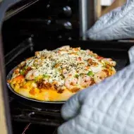 Una pizza al horno, un tipo de cocción.