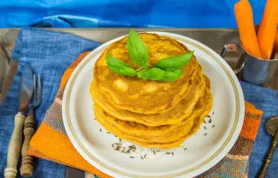 Pancakes Esponjositos de Zanahoria con NIDO® NUTRIADVANCE® Pancakes Esponjositos de Zanahoria con NIDO® NUTRIADVANCE®
