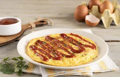 Tortilla de Huevo con Jamón y Queso Tortilla de Huevo con Jamón y Queso