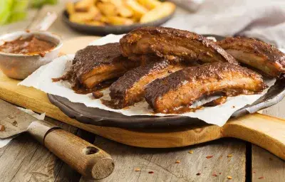Costillas entomatadas Costillas entomatadas