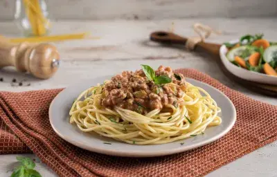 Fideos con Carne en Salsa Rosa